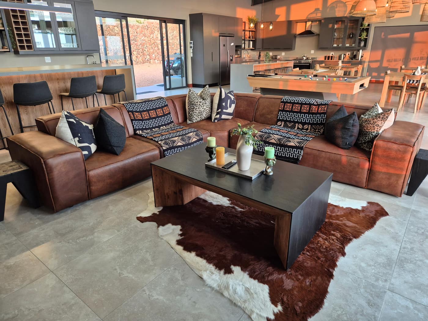 Iketla Cottages entertainment area with pool and shared facilities